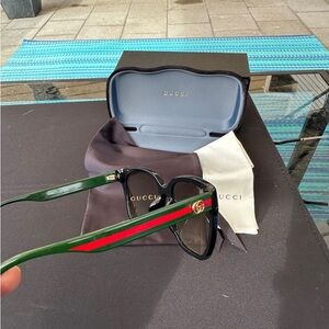 Gucci Black Frame Sunglasses with Green Temples & Red Stripe